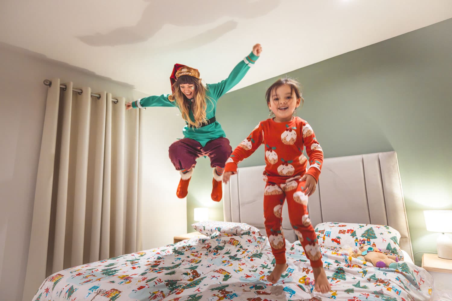 Elf and girl jumping on bed Bluestone