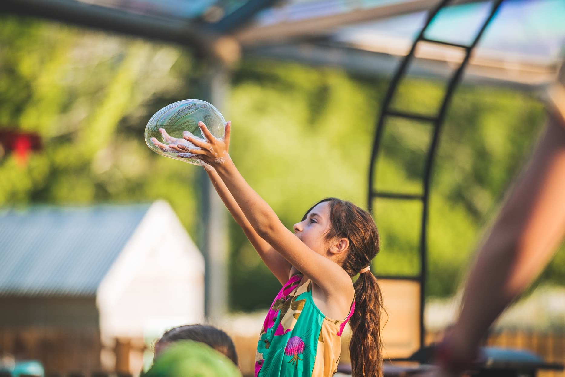 Girl with bubble in hands