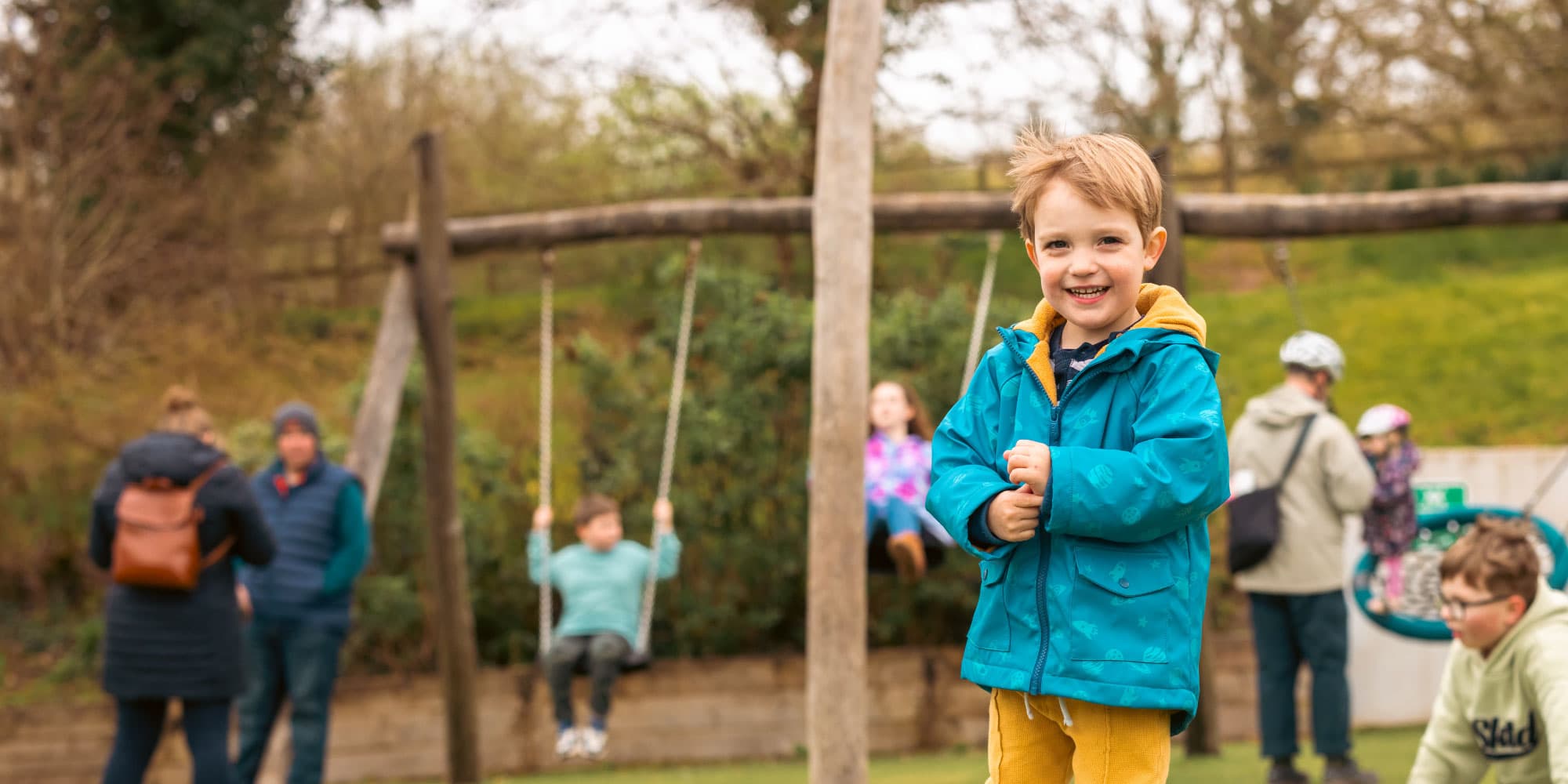 Boy smiling in the Village Playground