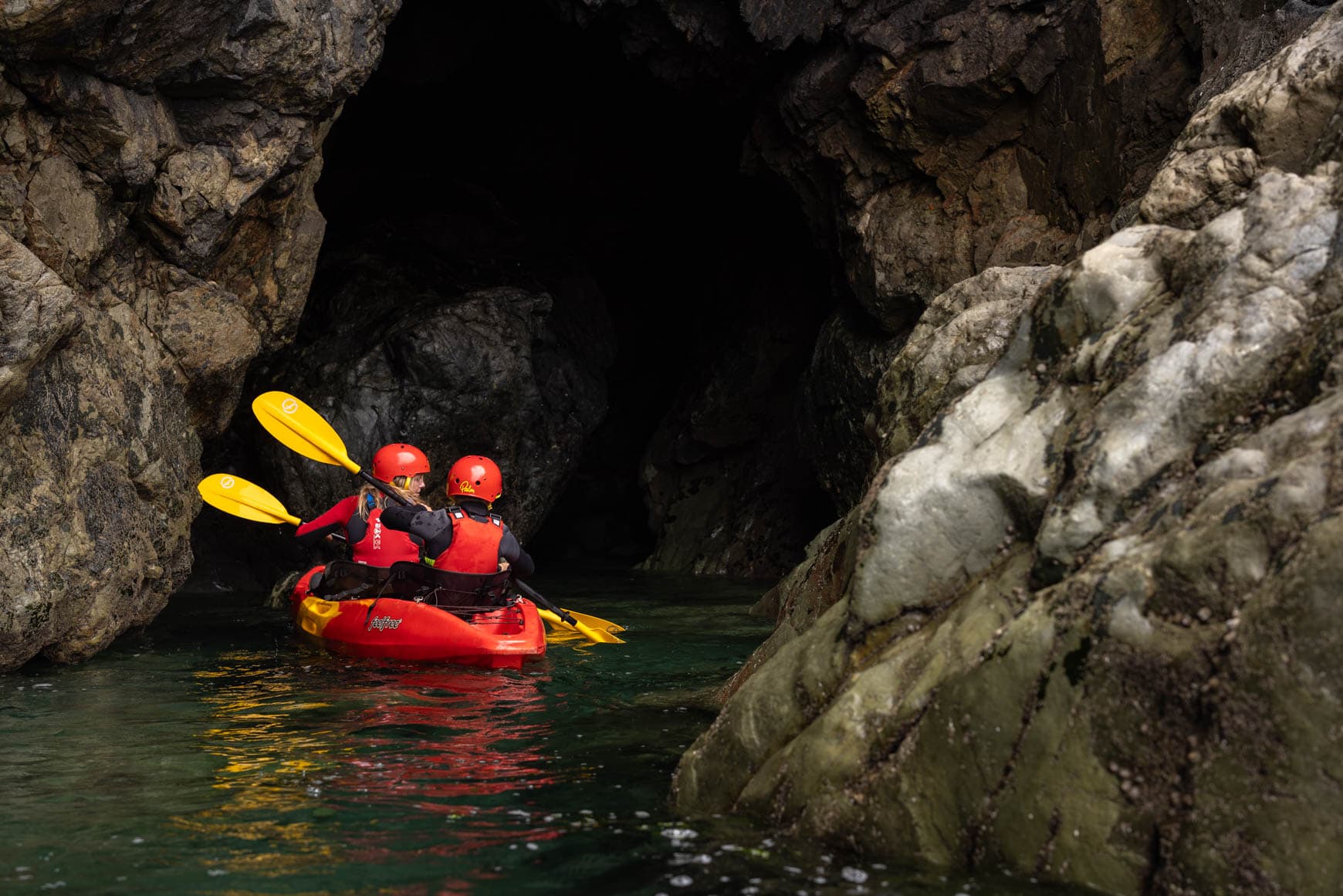 Adventure kayaking cave